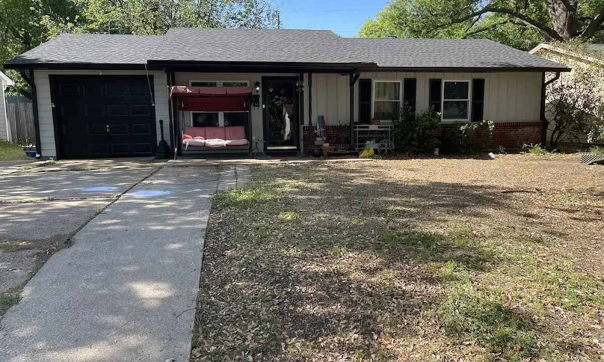 Asphalt Shingle Roof Repair crew at work on a residential roof in Stonecrest